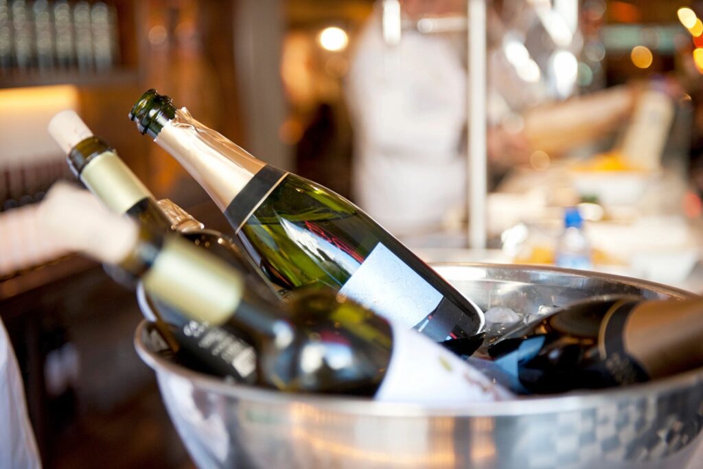 Champagne and white wine bottles chilling, in Paris